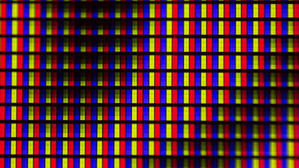 Oled-paneel ingezoomd op gekleurde pixels waarvan sommige gedimd zijn