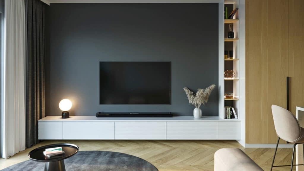 tv staat in woonkamer, onder de tv staat een soundbar